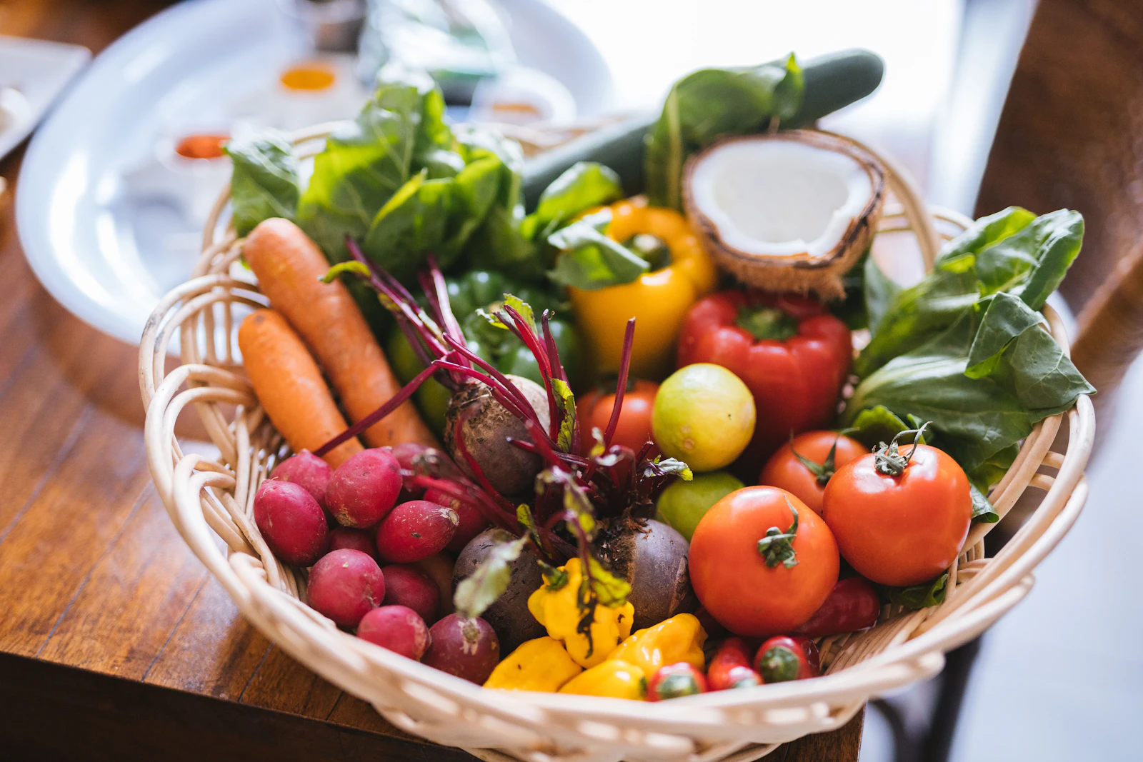 Crates and baskets of just-picked garden vegetables